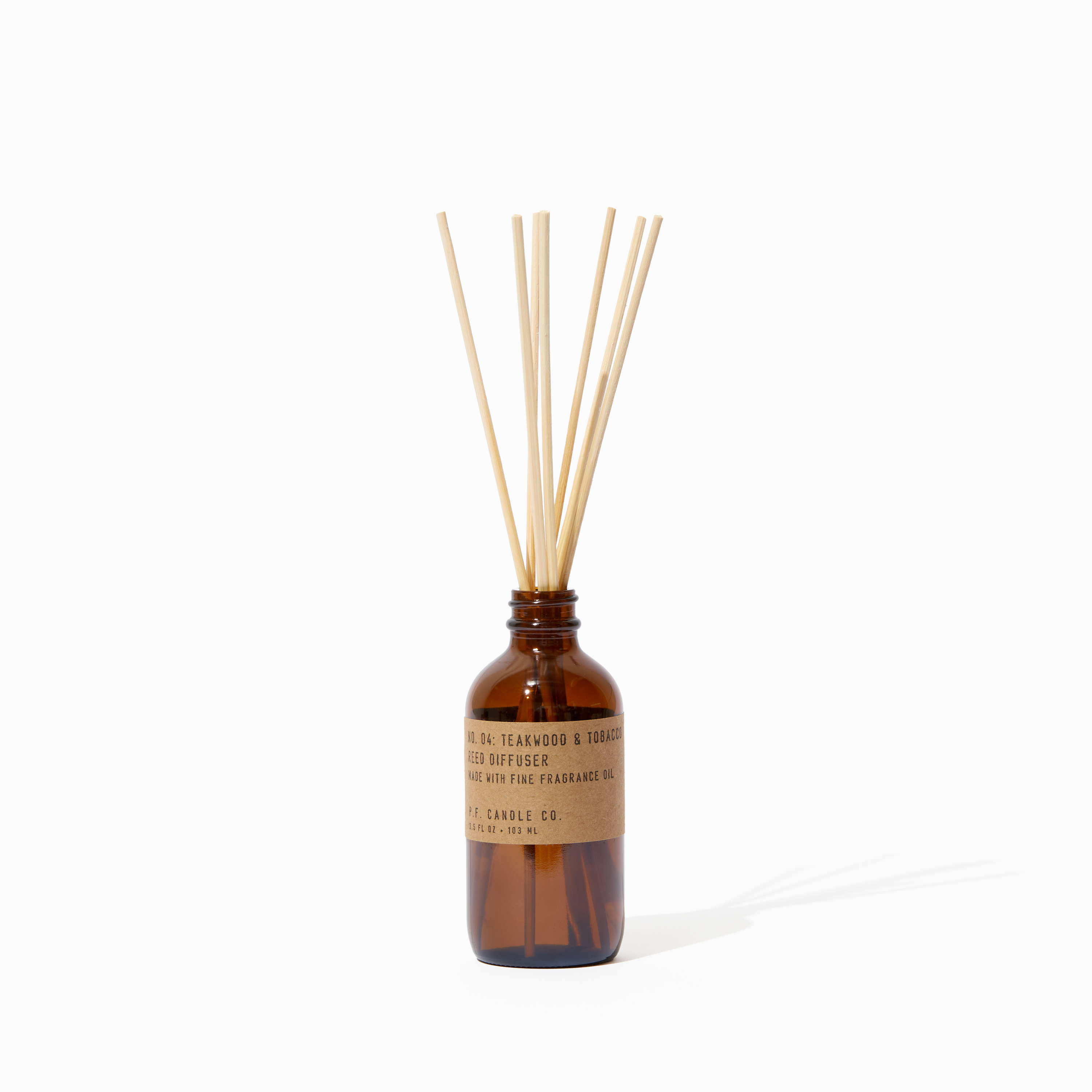 P.F. Candle Co. Teakwood & Tobacco Reed Diffuser - Product - Packaged in apothecary-inspired amber glass bottles with our signature kraft label and rattan reeds. Low-maintenance scent throw, all day long - no match necessary.